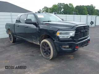 2020 Ram 2500 Laramie with VIN 3C6UR5NL0LG103983, listed as a IAAI auction lot 42420625 with 142,799 mi miles and . Bid and sale history available at DreamBid. Image 1.