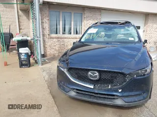 2018 Mazda CX-5 Grand Touring with VIN JM3KFADM1J1439544, listed as a IAAI auction lot 41891134 with 54,132 mi miles and . Bid and sale history available at DreamBid. Image 12.