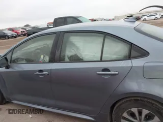 2021 Toyota Corolla Hybrid LE with VIN JTDEAMDE8MJ002711, listed as a IAAI auction lot 41498716 with 98,559 mi miles. Bid and sale history available at carsss.com. Image 13.
