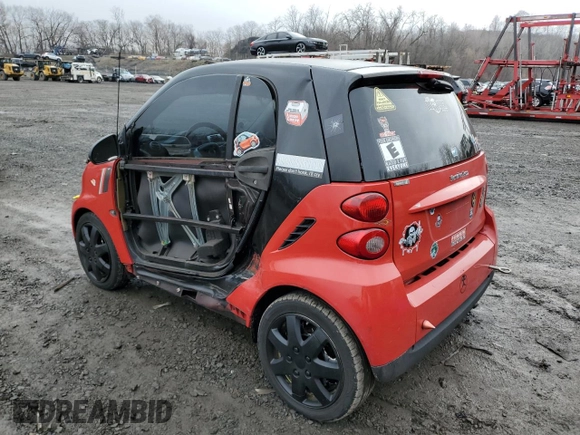 2012 Smart fortwo Pure z VIN WMEEJ3BA2CK571073, wystawiony jako Copart lot #51215135 z przebiegiem 78 686 mil mil oraz Szkoda całkowita • Salvage title. Historia ofert i sprzedaży dostępna na DreamBid. Obrazek 2.