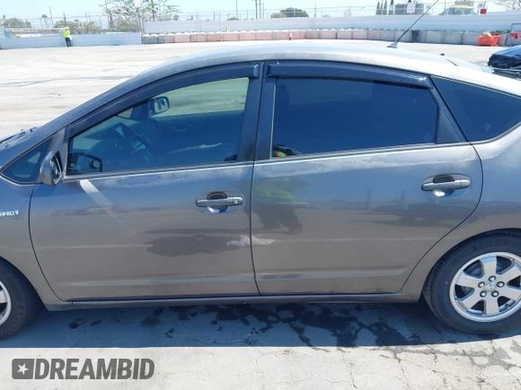 2007 Toyota Prius with VIN JTDKB20U073272767, listed as a IAAI auction lot 42520125 with 290,808 mi miles and . Bid and sale history available at DreamBid. Image 14.