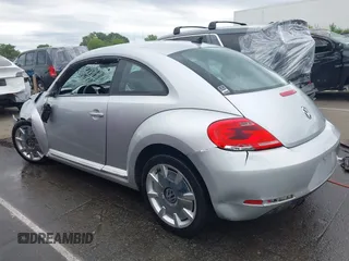 2012 Volkswagen Beetle 2.5L w/Sun PZEV с VIN 3VWJP7AT5CM603672, выставлен на аукционе IAAI как лот 42258888 с пробегом 115 511 миль миль и . История ставок и продаж доступна на DreamBid. Изображение 14.