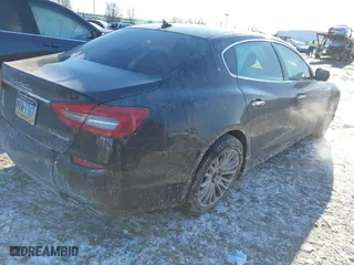 2014 Maserati Quattroporte S Q4 with VIN ZAM56RRA3E1123504, listed as a IAAI auction lot 41395299 with 49,192 mi miles. Bid and sale history available at carsss.com. Image 4.