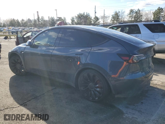 2022 Tesla Model Y Performance with VIN 7SAYGDEF0NF452111, listed as a Copart auction lot 47595975 with 33,514 mi miles and Salvage Title. Bid and sale history available at DreamBid. Image 2.