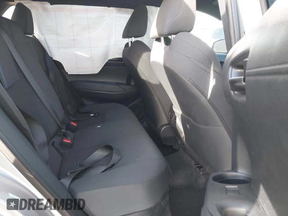 2023 Toyota Corolla Cross Hybrid S with VIN 7MUFBABG8PV011345, listed as a IAAI auction lot 41286619 with 13,518 mi miles and . Bid and sale history available at DreamBid. Image 8.