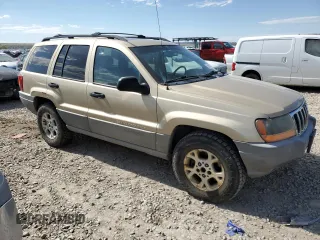 2000 Jeep Grand Cherokee Laredo with VIN 1J4GW48S6YC304447, listed as a Copart auction lot 58001035 with Not provided miles and Clean title. Bid and sale history available at DreamBid. Image 4.