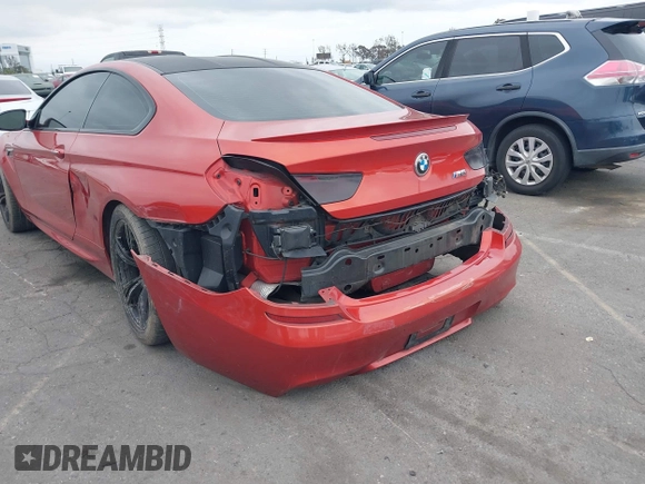 2013 BMW M6 z VIN WBSLX9C55DC968497, wystawiony jako IAAI lot #41863884 z przebiegiem 128 241 mil mil oraz . Historia ofert i sprzedaży dostępna na DreamBid. Obrazek 6.