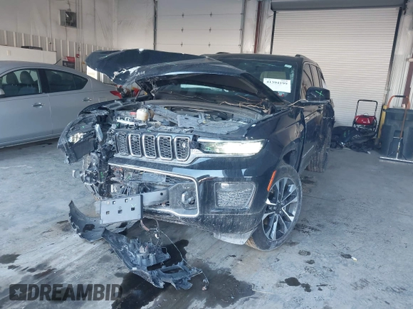 2023 Jeep Grand Cherokee Overland with VIN 1C4RJHDG5PC507978, listed as a IAAI auction lot 41394199 with 57,323 mi miles and . Bid and sale history available at DreamBid. Image 18.