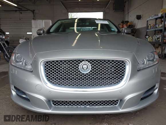 2013 Jaguar XJ Portfolio with VIN SAJWJ2GD0D8V50948, listed as a IAAI auction lot 42067884 with 110,053 mi miles and . Bid and sale history available at DreamBid. Image 6.