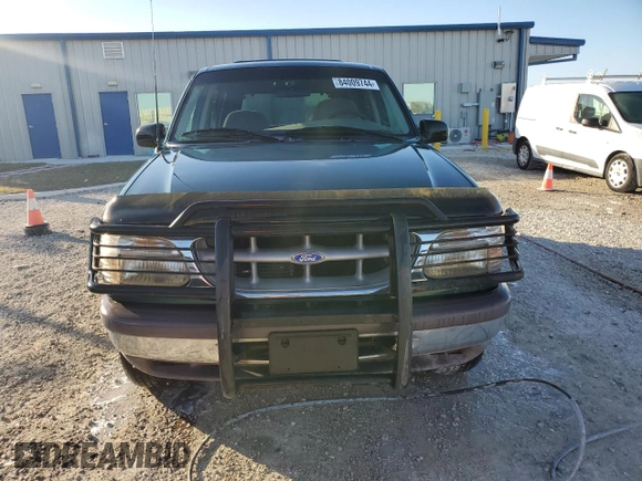 1997 Ford Explorer XL with VIN 1FMDU34E5VZB40878, listed as a Copart auction lot 84009744 with 185,047 mi miles and Salvage title. Bid and sale history available at DreamBid. Image 5.