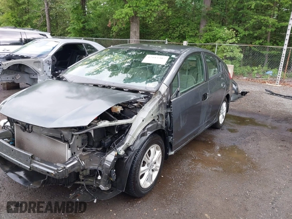 2010 Honda Insight EX with VIN JHMZE2H73AS025856, listed as a IAAI auction lot 42183307 with 71,564 mi miles and . Bid and sale history available at DreamBid. Image 6.
