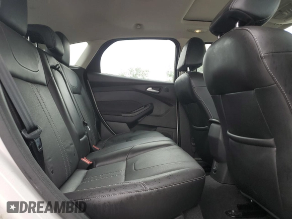 2014 Ford Focus Titanium with VIN 1FADP3N28EL418651, listed as a Copart auction lot 56723475 with 94,773 mi miles and Salvage title. Bid and sale history available at DreamBid. Image 10.