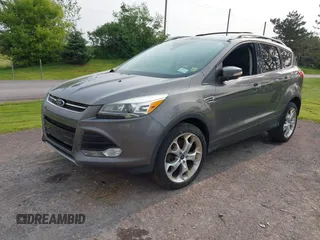 2013 Ford Escape Titanium with VIN 1FMCU9J96DUD74870, listed as a IAAI auction lot 42415332 with 178,651 mi miles and . Bid and sale history available at DreamBid. Image 2.