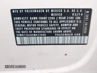 2014 Volkswagen Jetta SE z VIN 3VWD17AJ5EM417940, wystawiony jako IAAI lot #42309894 z przebiegiem 118 208 mil mil oraz . Historia ofert i sprzedaży dostępna na DreamBid. Obrazek 9.