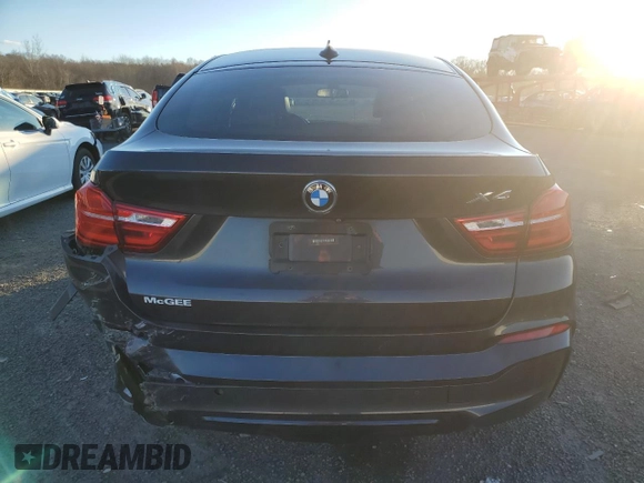 2016 BMW X4 xDrive28i z VIN 5UXXW3C58G0M90492, wystawiony jako Copart lot #87219454 z przebiegiem 129 335 mil mil oraz Szkoda całkowita • Salvage title. Historia ofert i sprzedaży dostępna na DreamBid. Obrazek 6.