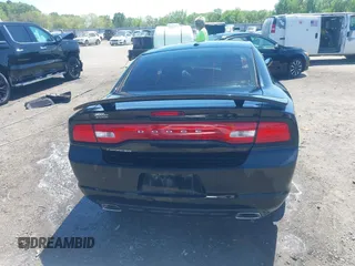 2014 Dodge Charger SE with VIN 2C3CDXBG7EH328575, listed as a IAAI auction lot 41998842 with 73,962 mi miles and . Bid and sale history available at carsss.com. Image 16.