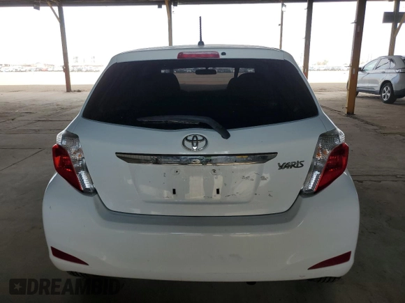 2014 Toyota Yaris L with VIN JTDJTUD31ED583248, listed as a Copart auction lot 65242084 with 163,573 mi miles and Clean Title. Bid and sale history available at carsss.com. Image 6.