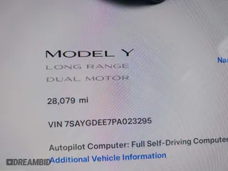 2023 Tesla Model Y Long Range with VIN 7SAYGDEE7PA023295, listed as a IAAI auction lot 41773783 with 28,079 mi miles. Bid and sale history available at carsss.com. Image 7.