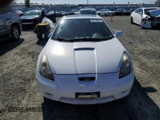 2000 Toyota Celica GT with VIN JTDDR32TXY0025709, listed as a Copart auction lot 46736585 with 184,635 mi miles and Salvage Title. Bid and sale history available at carsss.com. Image 5.
