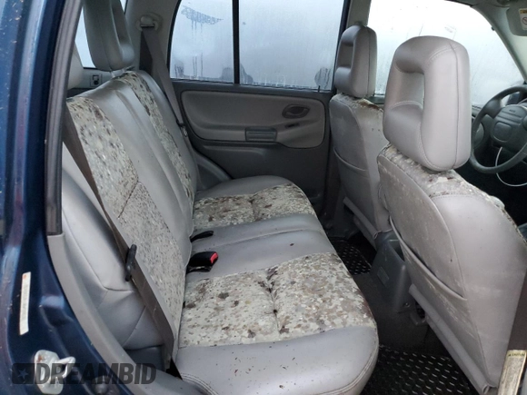 2002 Chevrolet Tracker LT with VIN 2CNBE634126928532, listed as a Copart auction lot 76990704 with Not provided miles and Salvage title. Bid and sale history available at DreamBid. Image 11.
