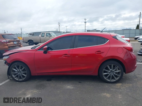 2018 Mazda 3 Touring with VIN 3MZBN1L33JM187560, listed as a IAAI auction lot 41692954 with 58,396 mi miles. Bid and sale history available at carsss.com. Image 15.