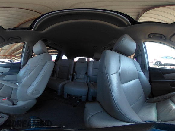 2012 Honda Odyssey EX-L with VIN 5FNRL5H6XCB103498, listed as a IAAI auction lot 42065658 with 104,933 mi miles and . Bid and sale history available at carsss.com. Image 18.
