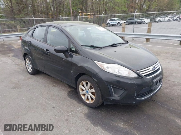 2011 Ford Fiesta SE with VIN 3FADP4BJ5BM221349, listed as a IAAI auction lot 41948737 with 216,540 mi miles. Bid and sale history available at carsss.com. Image 1.