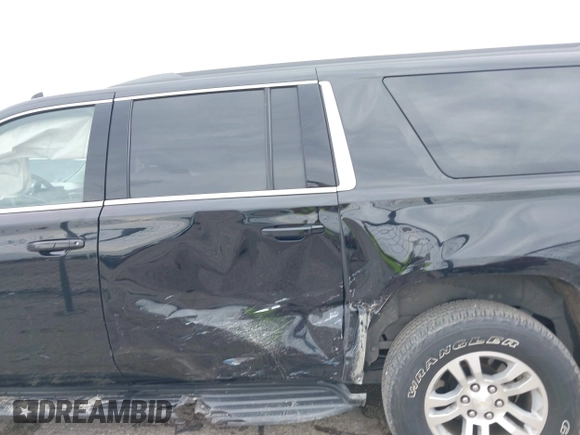 2020 Chevrolet Suburban LT with VIN 1GNSKHKC9LR103062, listed as a IAAI auction lot 42478008 with 229,786 mi miles and . Bid and sale history available at DreamBid. Image 14.