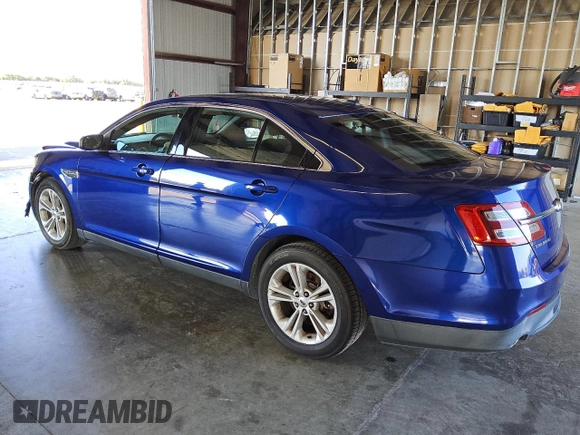 2015 Ford Taurus SEL with VIN 1FAHP2E82FG173002, listed as a Copart auction lot 76084694 with 163,626 mi miles and Clean title. Bid and sale history available at DreamBid. Image 2.