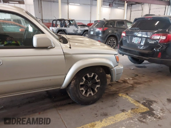 2000 Toyota 4Runner SR5 z VIN JT3HN86R6Y0294870, wystawiony jako IAAI lot #42131835 z przebiegiem 292 259 mil mil oraz . Historia ofert i sprzedaży dostępna na DreamBid. Obrazek 13.