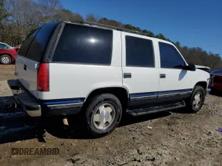 1997 GMC Yukon with VIN 1GKEK13R0VJ747359, listed as a Copart auction lot 48301095 with 272,417 mi miles and Salvage Title. Bid and sale history available at carsss.com. Image 3.