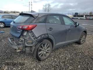 2017 Mazda CX-3 Touring with VIN JM1DKFC74H0176455, listed as a Copart auction lot 48825935 with 90,486 mi miles and Salvage Title. Bid and sale history available at carsss.com. Image 3.