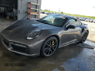 2022 Porsche 911 Turbo S z VIN WP0AD2A91NS255589, wystawiony jako Copart lot #60695644 z przebiegiem 6 562 mil mil oraz Nie do naprawy • Non repairable. Historia ofert i sprzedaży dostępna na DreamBid. Obrazek 1.