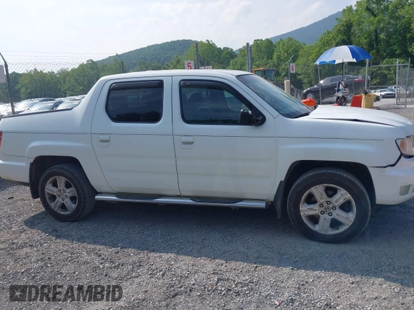 2010 Honda Ridgeline RTL with VIN 5FPYK1F58AB012526, listed as a IAAI auction lot 42421618 with 258,727 mi miles and . Bid and sale history available at DreamBid. Image 13.