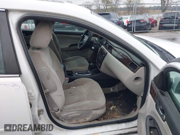 2014 Chevrolet Impala LT z VIN 2G1WB5E30E1140901, wystawiony jako IAAI lot #42106456 z przebiegiem 119 529 mil mil oraz . Historia ofert i sprzedaży dostępna na DreamBid. Obrazek 5.