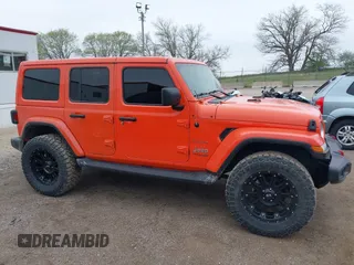 2020 Jeep Wrangler Unlimited Sahara with VIN 1C4HJXENXLW231194, listed as a IAAI auction lot 42083147 with 34,166 mi miles. Bid and sale history available at carsss.com. Image 14.
