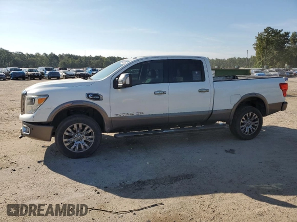 2016 Nissan Titan XD Platinum Reserve with VIN 1N6BA1F46GN506609, listed as a Copart auction lot 69445824 with 126,228 mi miles and Salvage Title. Bid and sale history available at carsss.com. Image 1.