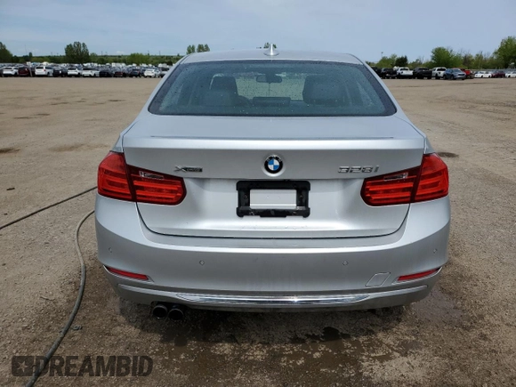 2013 BMW 3 Series 328i xDrive with VIN WBA3B3C5XDF531142, listed as a Copart auction lot 58651745 with 209,990 mi miles and Clean title. Bid and sale history available at DreamBid. Image 6.