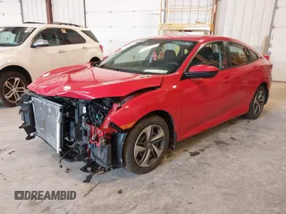 2020 Honda Civic LX with VIN 2HGFC2F63LH507310, listed as a IAAI auction lot 42180914 with 54,599 mi miles and . Bid and sale history available at DreamBid. Image 19.