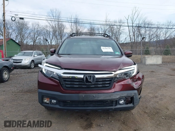 2018 Honda Ridgeline RTL-T with VIN 5FPYK3F69JB010983, listed as a IAAI auction lot 41781716 with 45,494 mi miles and . Bid and sale history available at DreamBid. Image 12.