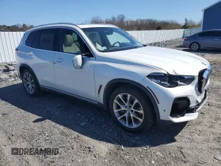 2021 BMW X5 xDrive45e with VIN 5UXTA6C02M9F03198, listed as a Copart auction lot 51805015 with 42,350 mi miles and Salvage Title. Bid and sale history available at DreamBid. Image 4.