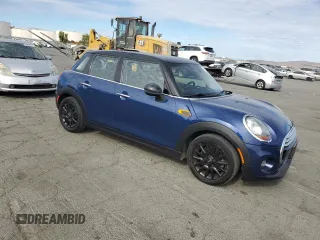 2015 MINI Hardtop 4 Door z VIN WMWXS5C5XFT831166, wystawiony jako Copart lot #78248204 z przebiegiem 69 459 mil mil oraz Szkoda całkowita • Salvage title. Historia ofert i sprzedaży dostępna na DreamBid. Obrazek 4.