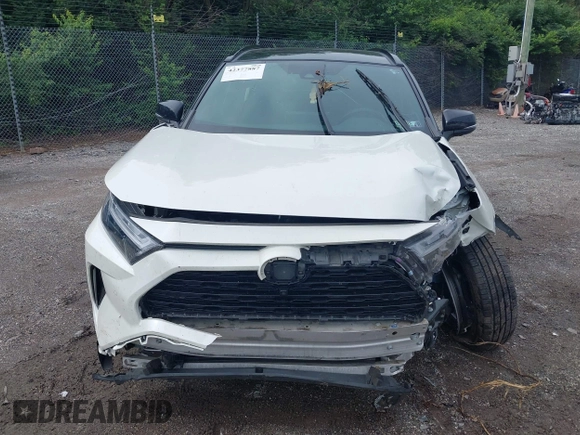 2022 Toyota RAV4 Hybrid XSE with VIN 4T3E6RFV6NU084601, listed as a IAAI auction lot 42377887 with 81,084 mi miles and . Bid and sale history available at DreamBid. Image 12.