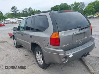 2007 GMC Envoy SLE with VIN 1GKDS13S572174308, listed as a IAAI auction lot 42211372 with 212,377 mi miles and . Bid and sale history available at DreamBid. Image 3.