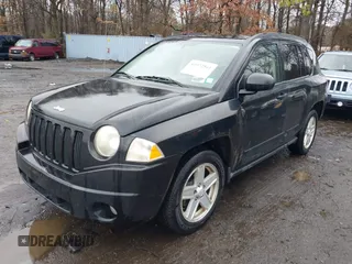 2008 Jeep Compass Sport with VIN 1J8FT47028D725448, listed as a IAAI auction lot 41972561 with 198,524 mi miles. Bid and sale history available at carsss.com. Image 2.