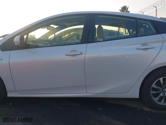 2022 Toyota Prius L Eco with VIN JTDKAMFU1N3181302, listed as a IAAI auction lot 41412650 with 92,397 mi miles. Bid and sale history available at carsss.com. Image 15.