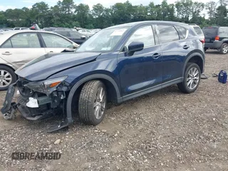 2019 Mazda CX-5 Grand Touring with VIN JM3KFBDM8K1521231, listed as a IAAI auction lot 42738963 with 32,179 mi miles and . Bid and sale history available at DreamBid. Image 2.
