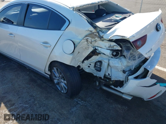 2022 Mazda 3 S with VIN JM1BPAALXN1508318, listed as a IAAI auction lot 41669583 with 38,620 mi miles and . Bid and sale history available at DreamBid. Image 6.