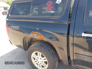 2012 GMC Canyon SLE1 z VIN 1GTH6MFE6C8140488, wystawiony jako IAAI lot #42399125 z przebiegiem 92 729 mil mil oraz . Historia ofert i sprzedaży dostępna na DreamBid. Obrazek 6.