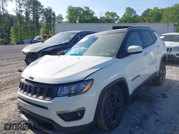 2021 Jeep Compass Altitude with VIN 3C4NJDBB2MT596181, listed as a IAAI auction lot 42026716 with 69,526 mi miles and . Bid and sale history available at DreamBid. Image 17.